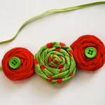 Christmas rosettes in green and red..